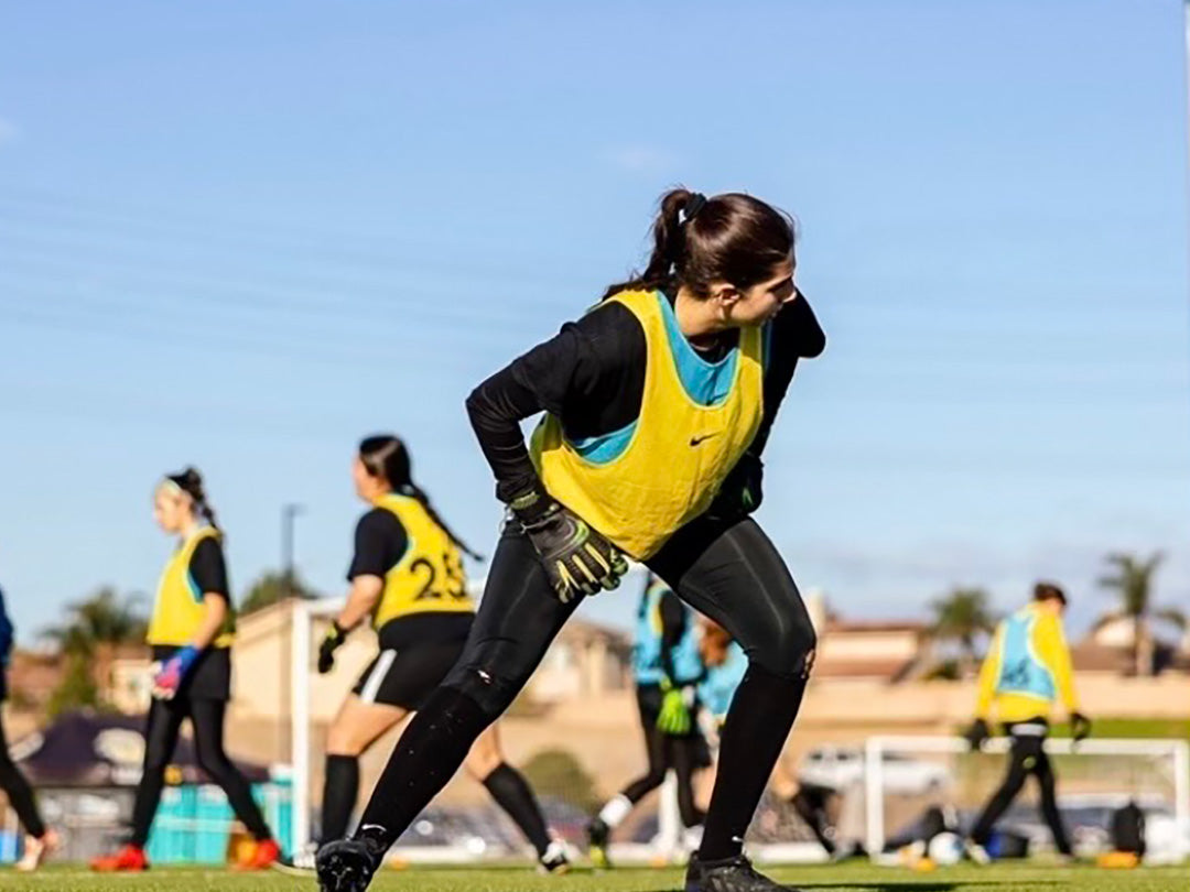 Athlete Stretching and using AMPRelief